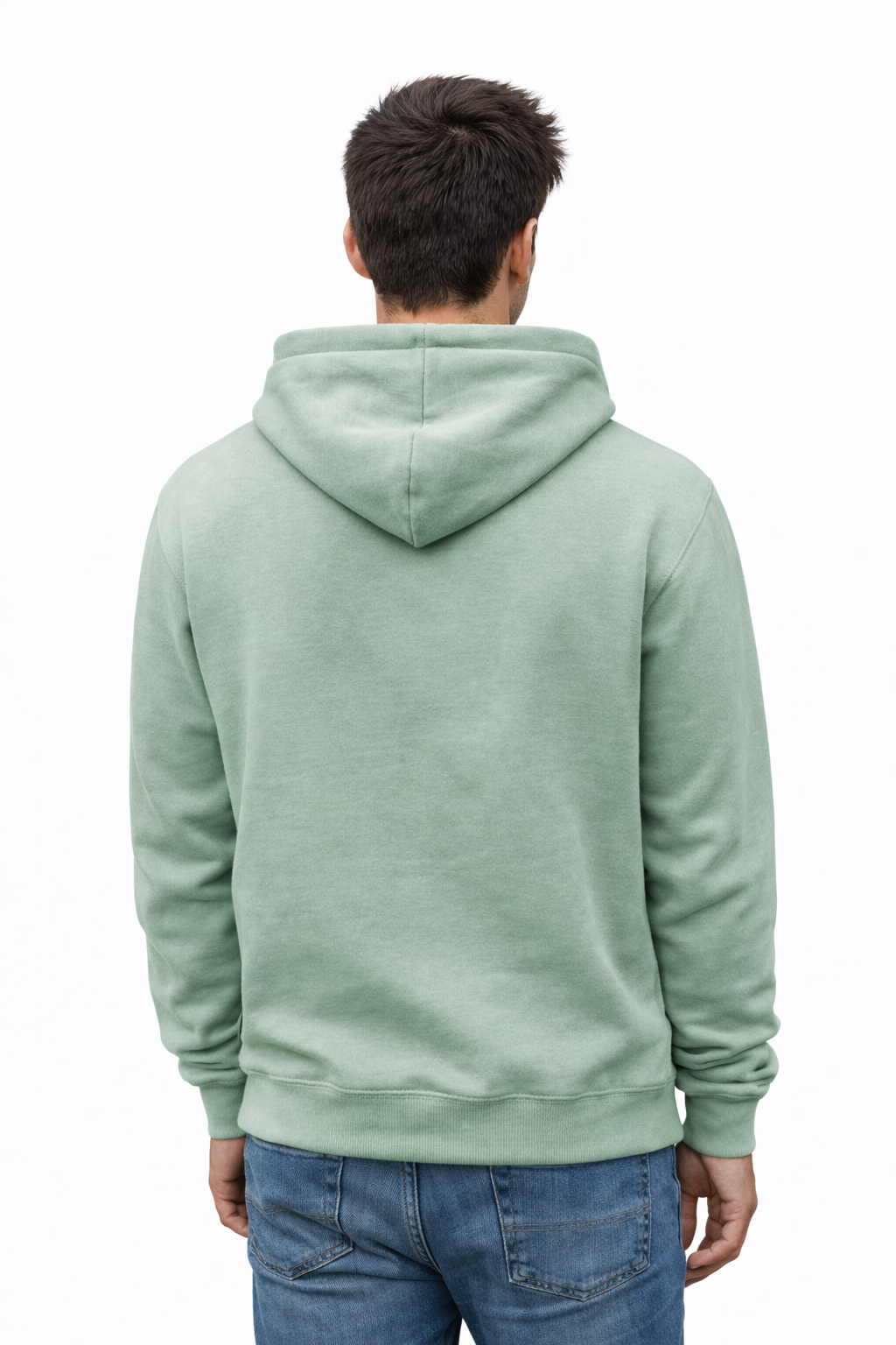 Person wearing a light green hoodie on a white background
