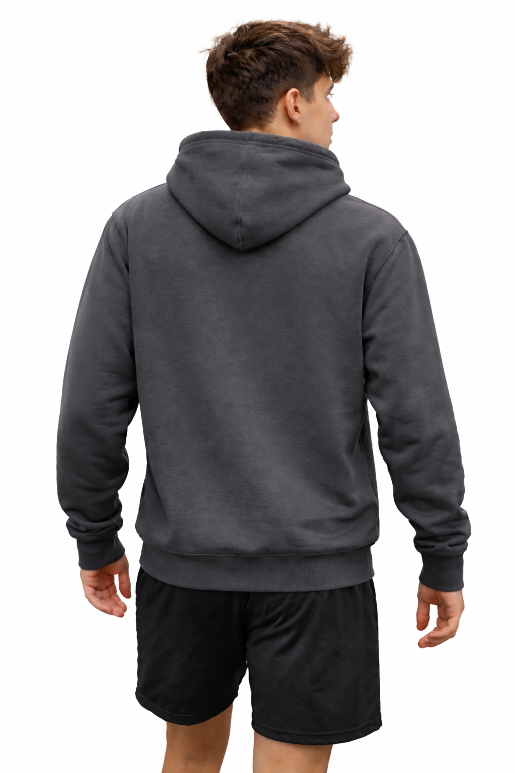 Person wearing a gray hoodie and black shorts on a white background