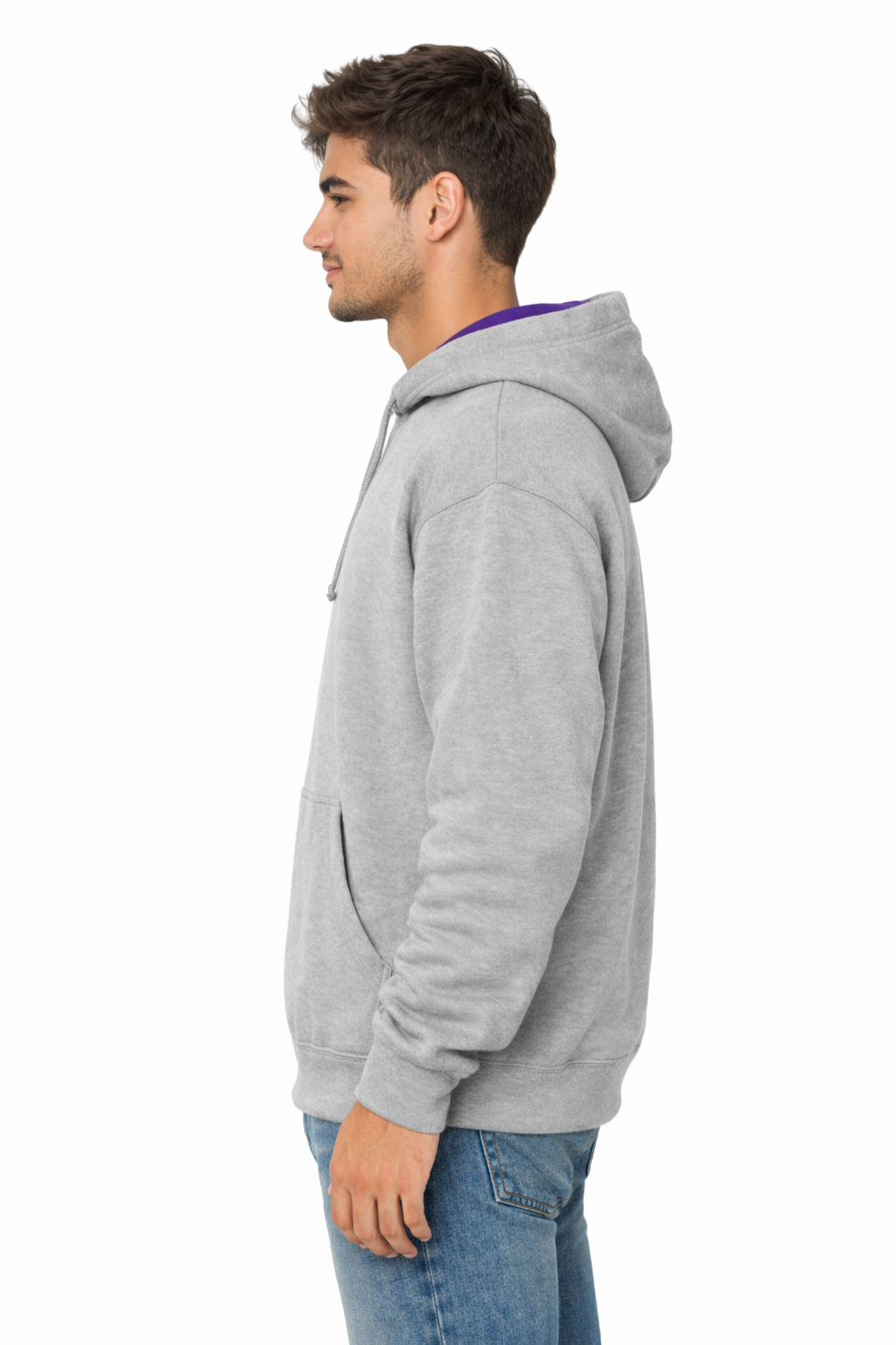 Man wearing a gray hoodie and blue jeans on a white background