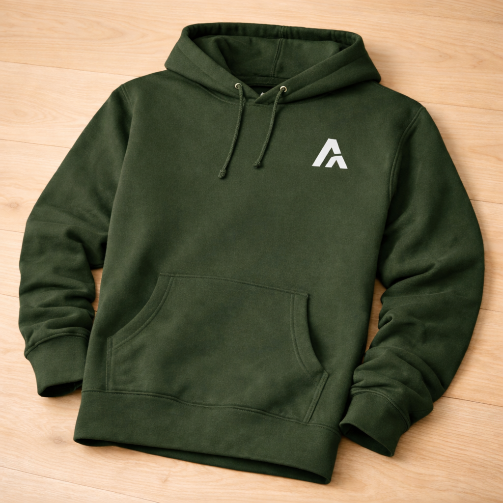 Green hoodie with a logo on a wooden surface
