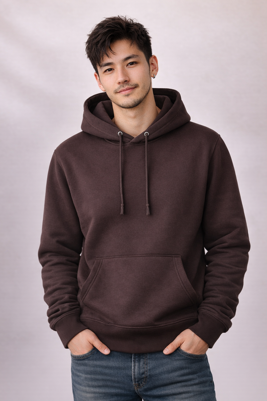 Front view of a man wearing a mens dark brown pullover hoodie with drawstrings and kangaroo pocket.