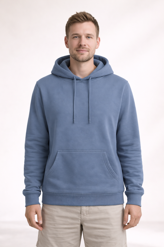 Front view of a man wearing a dusty blue pullover hoodie with drawstrings and kangaroo pocket.